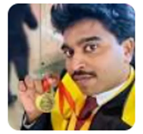 Dr. Pratheep Samraj in academic robes holding his gold medal